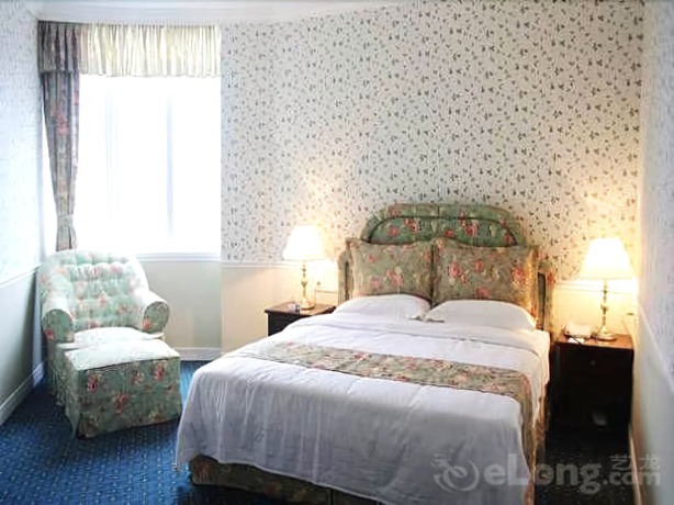 Imagen de la habitación del Hotel Oak Hotel- Chongqing. Foto 5