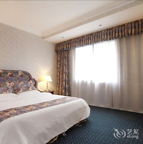 Imagen de la habitación del Hotel Oak Hotel- Chongqing. Foto 7