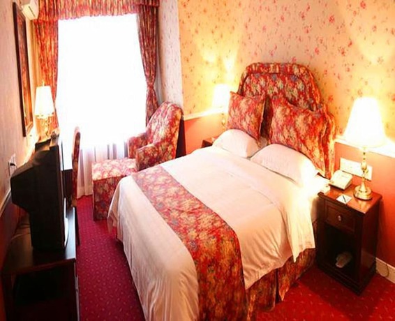 Imagen de la habitación del Hotel Oak Hotel- Chongqing. Foto 15