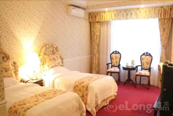 Imagen de la habitación del Hotel Oak Hotel- Chongqing. Foto 16