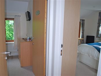 Imagen de la habitación del Hotel Oak Lodge Bed and Breakfast. Foto 2