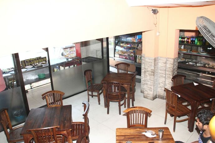 Imagen del bar/restaurante del Hotel Oak Ray City. Foto 3