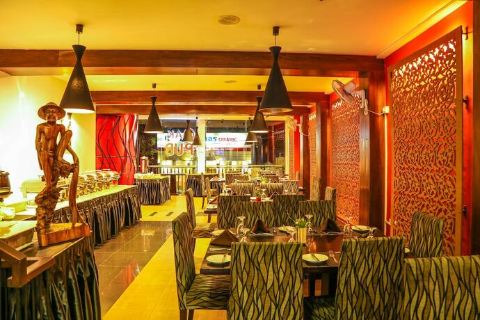 Imagen del bar/restaurante del Hotel Oak Ray City. Foto 4
