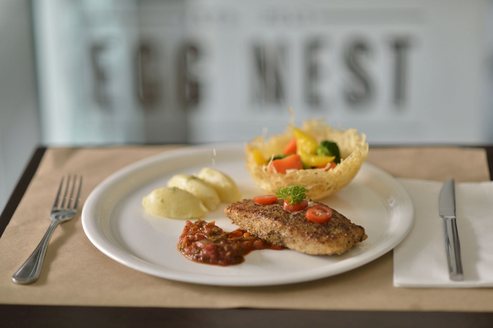Imagen del bar/restaurante del Hotel Oak Tree Urban Jakarta. Foto 4