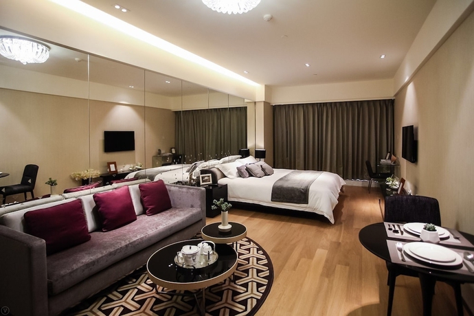 Imagen de la habitación del Hotel Oakmade International Service Apartment. Foto 4