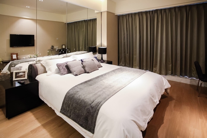 Imagen de la habitación del Hotel Oakmade International Service Apartment. Foto 9