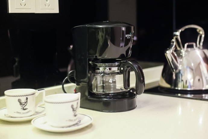 Imagen de la habitación del Hotel Oakmade International Service Apartment. Foto 11