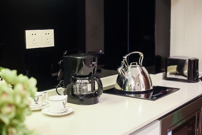 Imagen de la habitación del Hotel Oakmade International Service Apartment. Foto 12