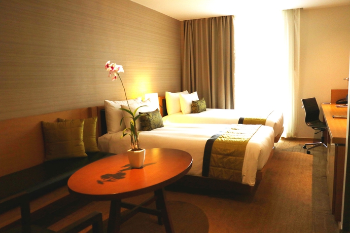 Imagen de la habitación del Hotel Oaks Bangkok Sathorn. Foto 2
