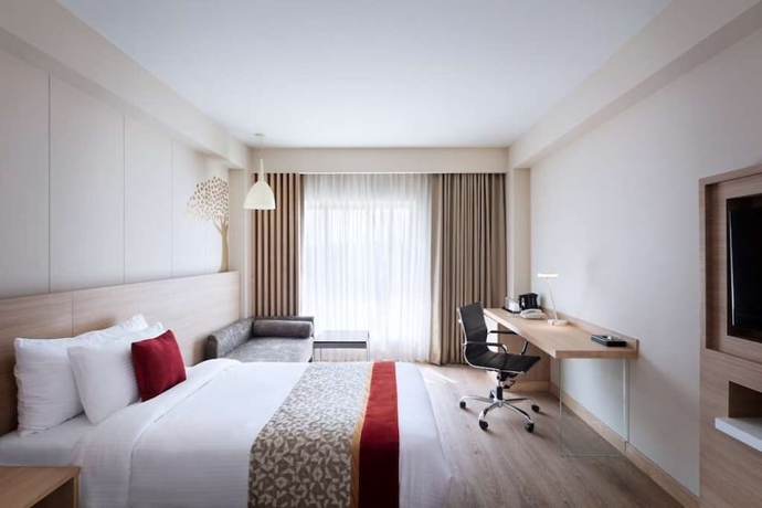 Imagen de la habitación del Hotel Oaks Bodhgaya. Foto 6