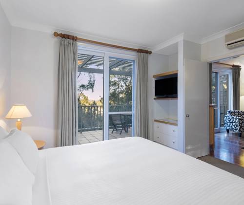 Imagen de la habitación del Hotel Oaks Cypress Lakes Resort. Foto 5