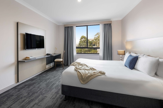 Imagen de la habitación del Hotel Oaks Sydney North Ryde Suites. Foto 2