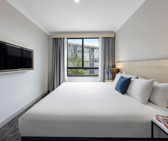 Imagen de la habitación del Hotel Oaks Sydney North Ryde Suites. Foto 7