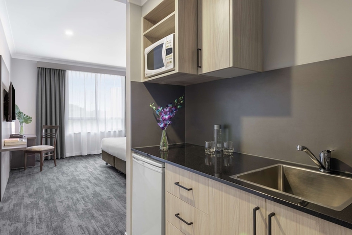 Imagen de la habitación del Hotel Oaks Sydney North Ryde Suites. Foto 15