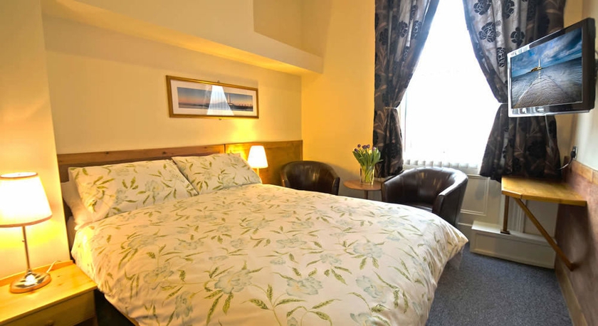 Imagen de la habitación del Hotel Oaktree Lodge. Foto 5