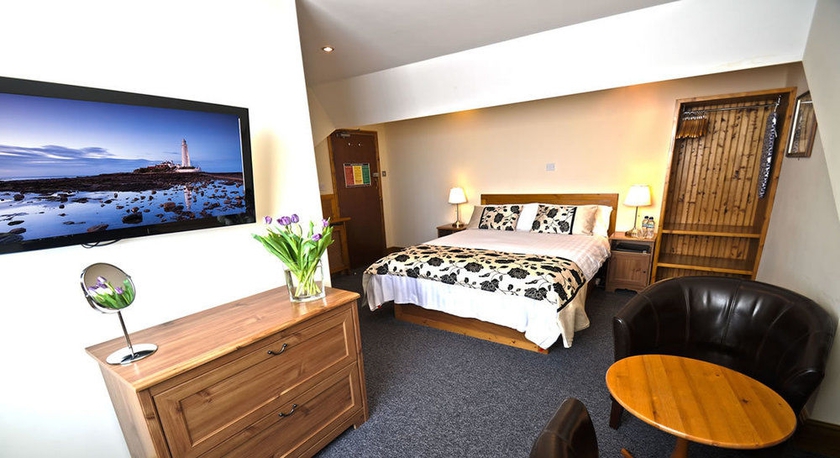 Imagen de la habitación del Hotel Oaktree Lodge. Foto 7