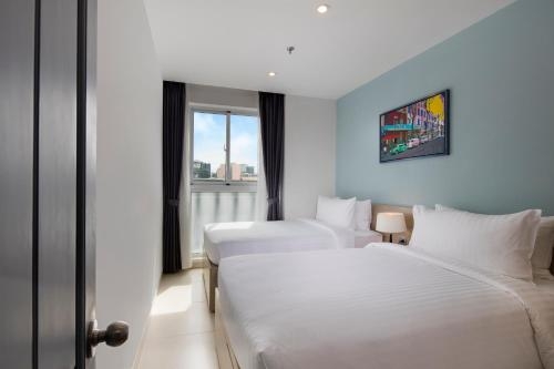 Imagen de la habitación del Hotel Oakwood Apartments Ho Chi Minh City. Foto 8