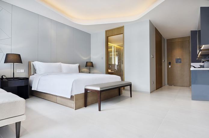 Imagen de la habitación del Hotel Oakwood Apartments Sanya. Foto 7