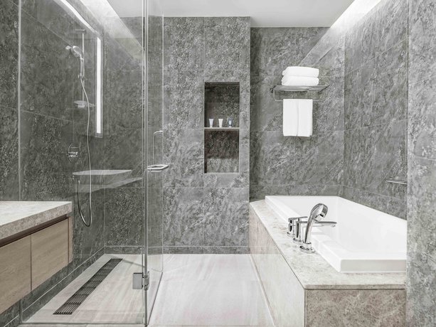 Imagen de la habitación del Hotel Oakwood Apartments Sanya. Foto 11