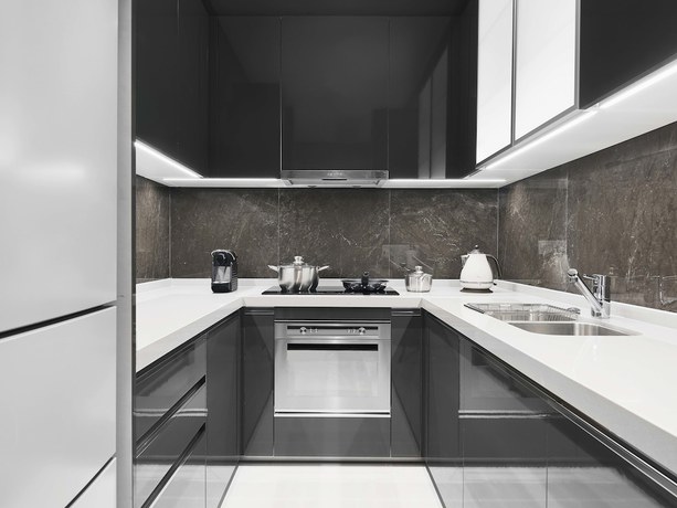 Imagen de la habitación del Hotel Oakwood Apartments Sanya. Foto 12