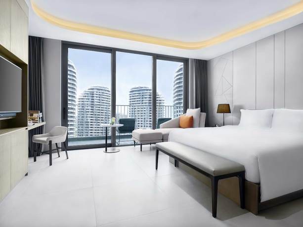 Imagen de la habitación del Hotel Oakwood Apartments Sanya. Foto 14