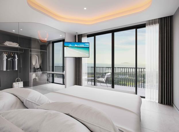 Imagen de la habitación del Hotel Oakwood Apartments Sanya. Foto 15