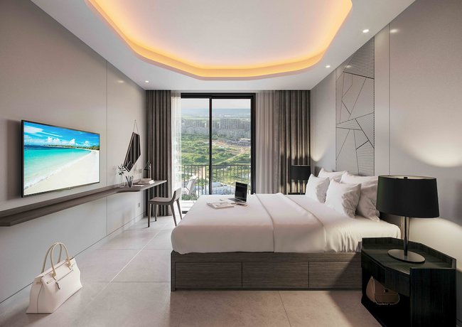 Imagen de la habitación del Hotel Oakwood Apartments Sanya. Foto 17
