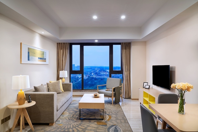 Imagen de la habitación del Hotel Oakwood Apartments Yangzhou. Foto 9