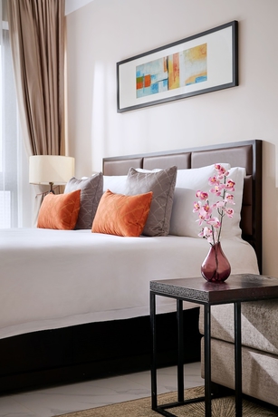 Imagen de la habitación del Hotel Oakwood Apartments Yangzhou. Foto 11