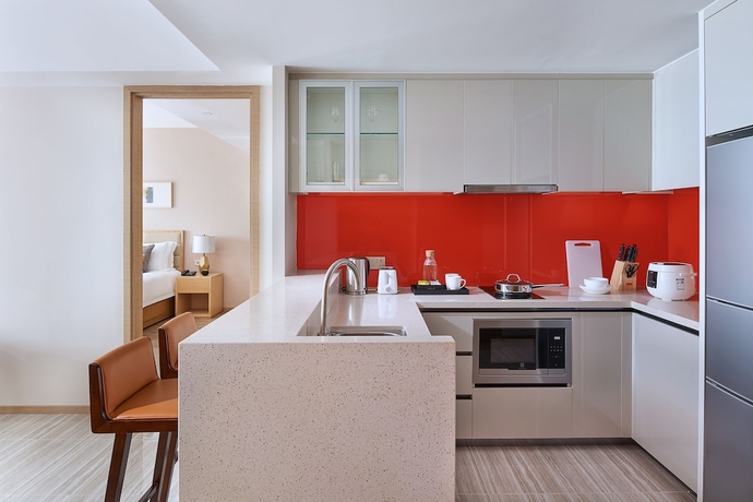 Imagen de la habitación del Hotel Oakwood Apartments Yangzhou. Foto 16