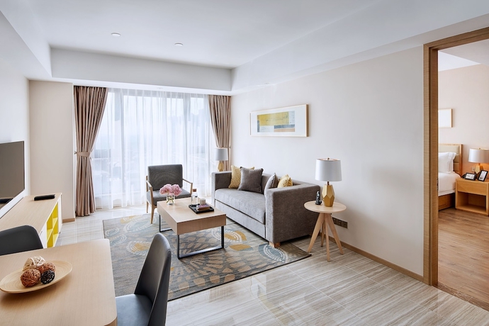 Imagen de la habitación del Hotel Oakwood Apartments Yangzhou. Foto 17