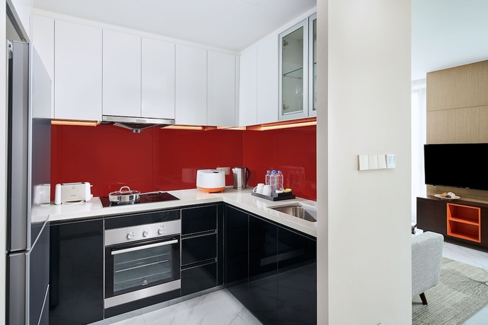 Imagen de la habitación del Hotel Oakwood Apartments Yangzhou. Foto 18