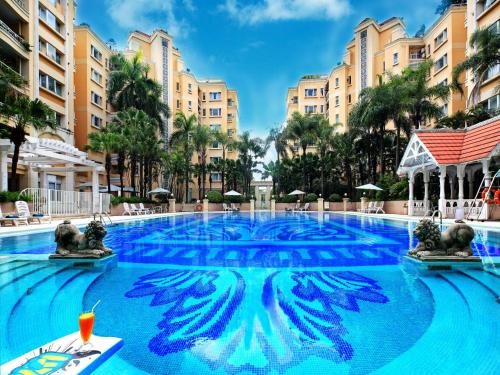 Imagen de la piscina del Hotel Oakwood Gold Arch Residence Guangzhou. Foto 11