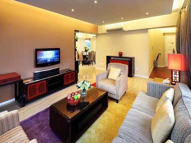 Imagen de la habitación del Hotel Oakwood Gold Arch Residence Guangzhou. Foto 8