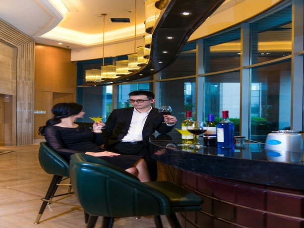 Imagen del bar/restaurante del Hotel Oakwood HotelandResidence Suzhou. Foto 4