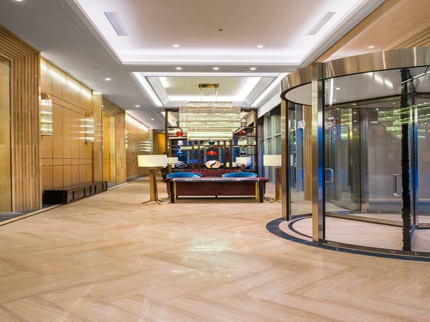 Imagen de los interiores del Hotel Oakwood HotelandResidence Suzhou. Foto 20