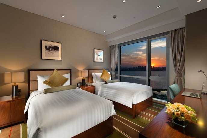 Imagen de la habitación del Hotel Oakwood HotelandResidence Suzhou. Foto 13