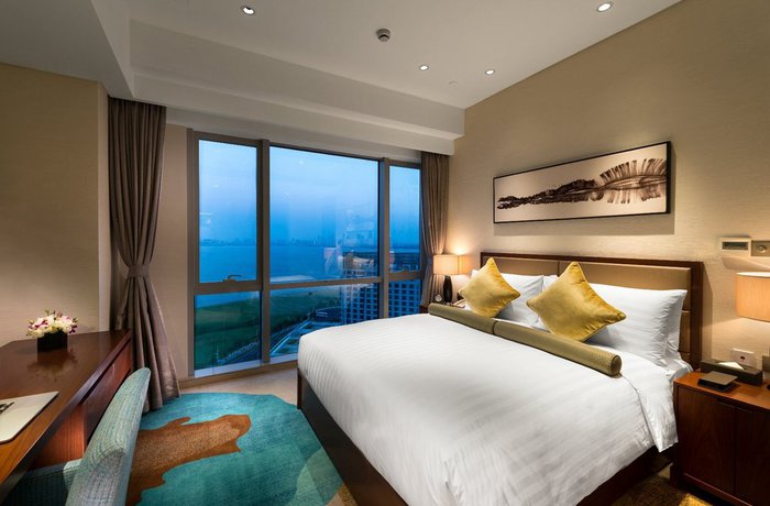 Imagen de la habitación del Hotel Oakwood HotelandResidence Suzhou. Foto 14