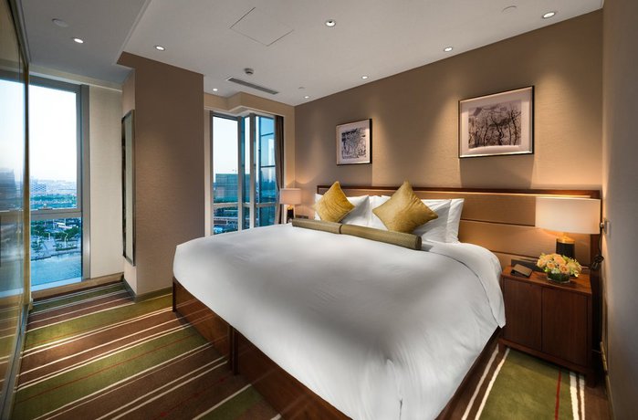 Imagen de la habitación del Hotel Oakwood HotelandResidence Suzhou. Foto 16