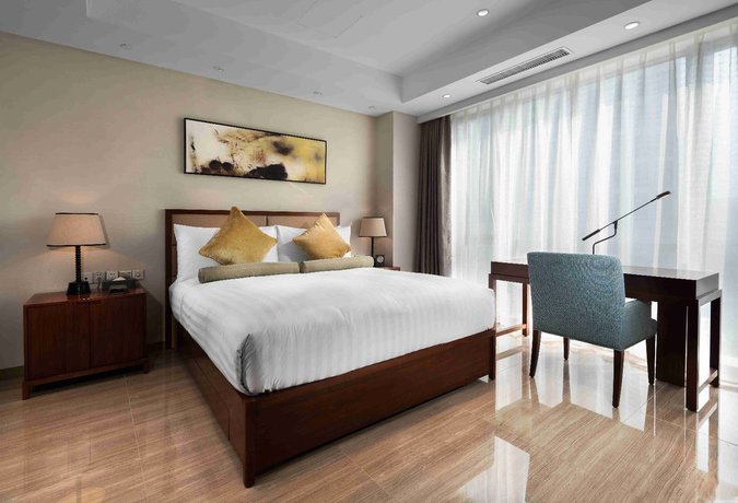 Imagen de la habitación del Hotel Oakwood HotelandResidence Suzhou. Foto 17