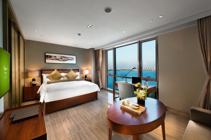 Imagen de la habitación del Hotel Oakwood HotelandResidence Suzhou. Foto 18