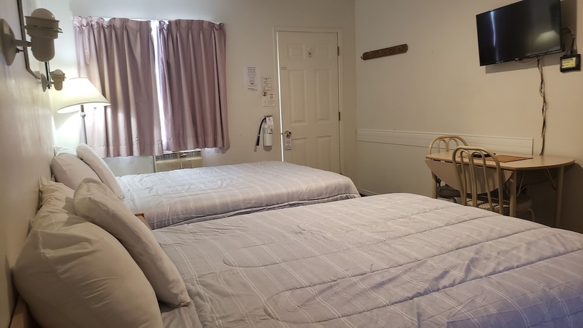 Imagen de la habitación del Hotel Oakwood Motel. Foto 9