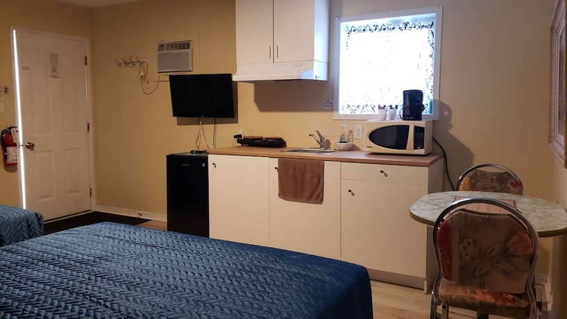 Imagen de la habitación del Hotel Oakwood Motel. Foto 12