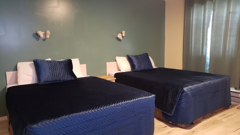 Imagen de la habitación del Hotel Oakwood Motel. Foto 13