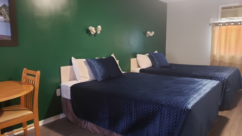 Imagen de la habitación del Hotel Oakwood Motel. Foto 15