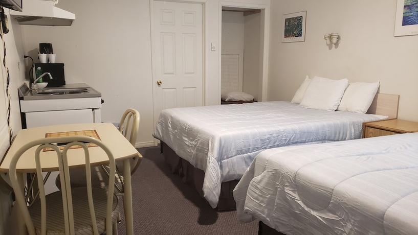 Imagen de la habitación del Hotel Oakwood Motel. Foto 16