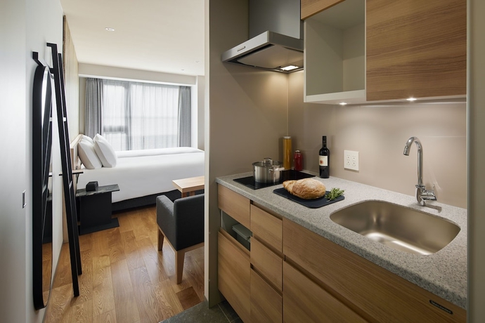 Imagen de la habitación del Hotel Oakwood Oike Kyoto. Foto 7