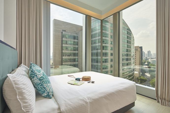 Imagen de la habitación del Hotel Oakwood Premier Raffles Place Singapore. Foto 9