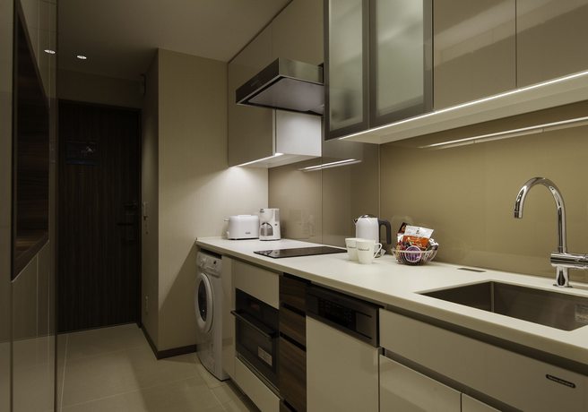 Imagen de la habitación del Hotel Oakwood Premier Tokyo. Foto 6