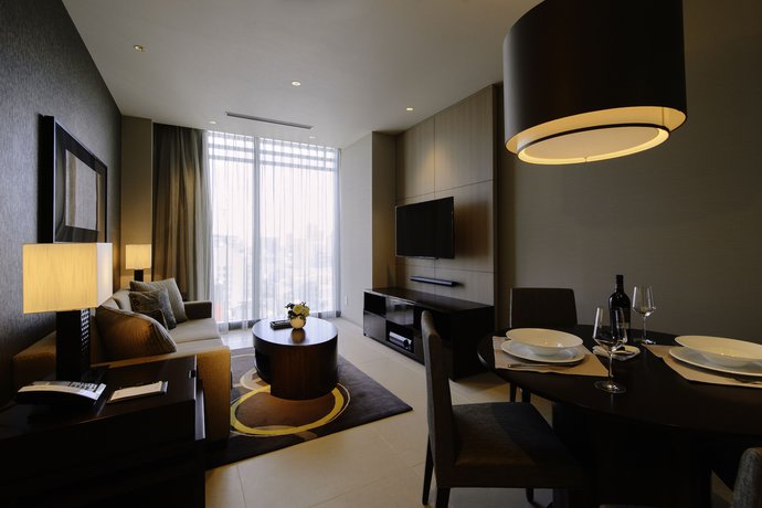 Imagen de la habitación del Hotel Oakwood Premier Tokyo. Foto 11